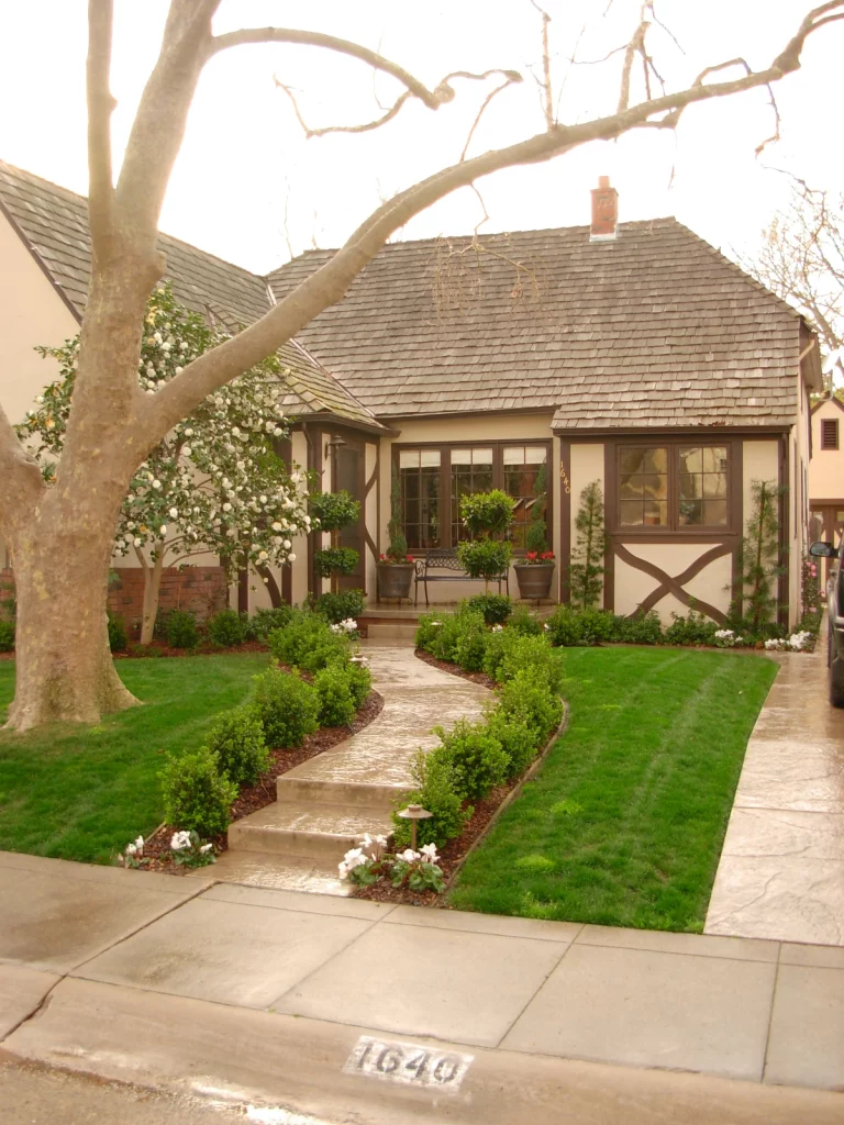 residential landscaping shrubs lining the walkway