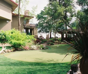 stone pathway and lush garden on a golf course